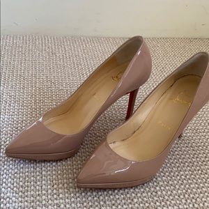 Christian Louboutin patent leather platform pumps.